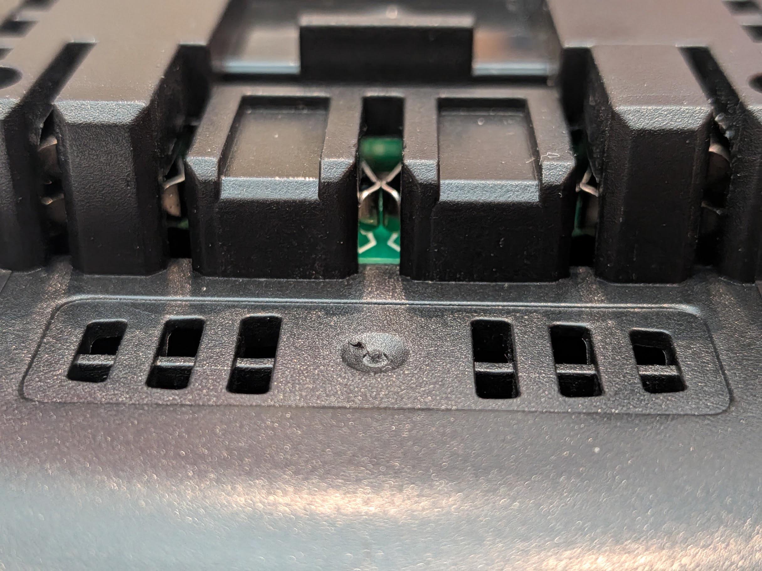 Makita 18V LXT to Bosch 18V GBA (Blue) battery adapter - close-up of the terminal block and circuit board edge