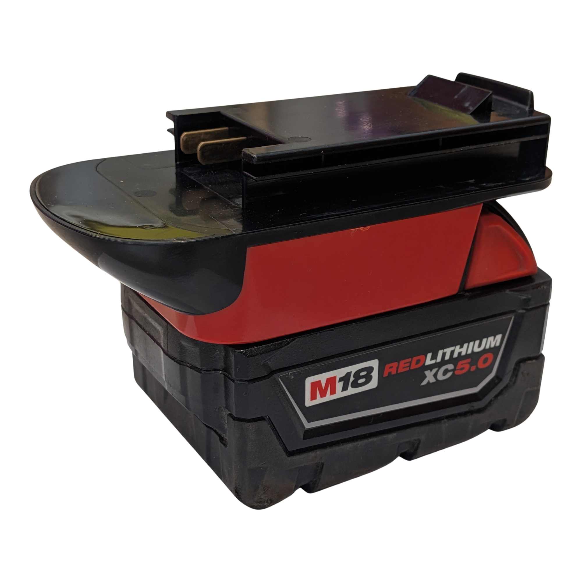 Milwaukee M18 to Black and Decker 18V Ni-Cd battery adapter - fitted to the Milwaukee M18 battery, copper blades in view