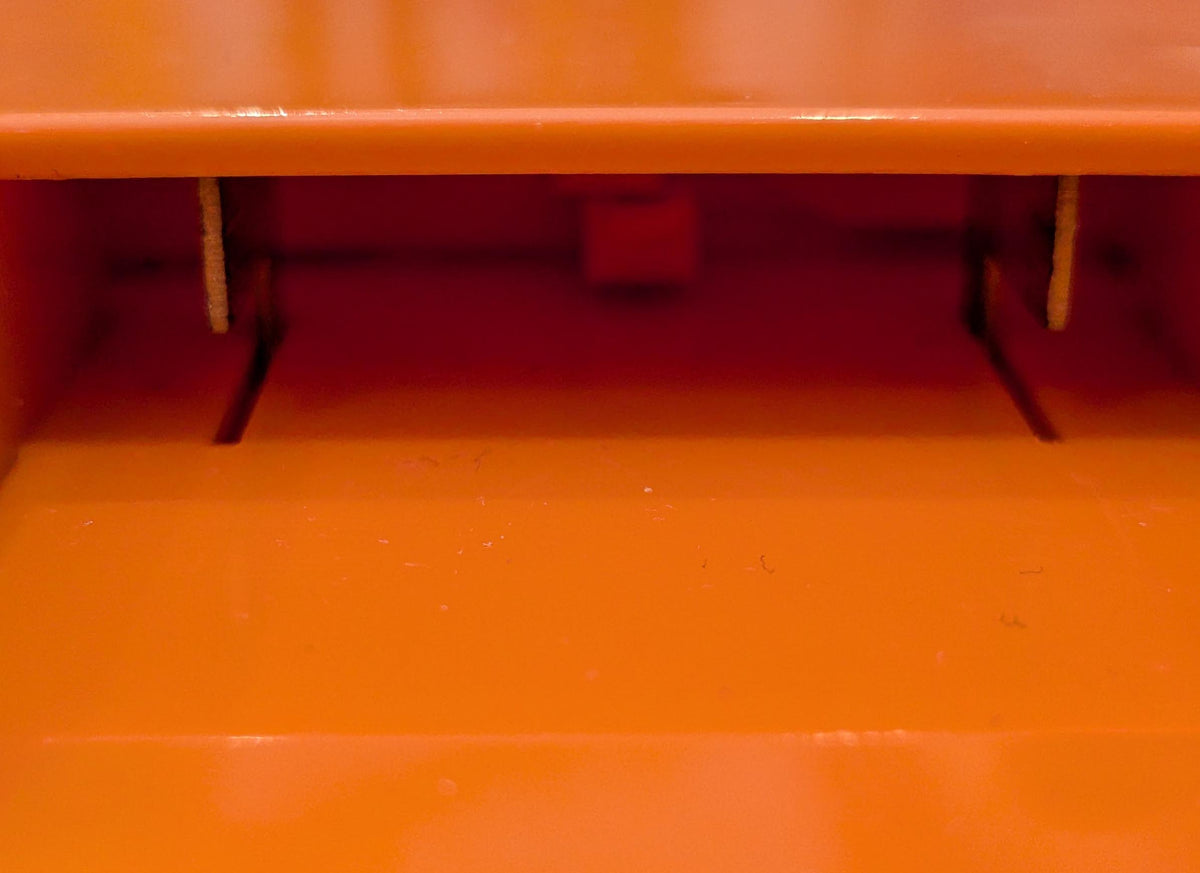 Milwaukee M18 to RIDGID 18V battery adapter - close-up of the spring contacts under the tool-side rail